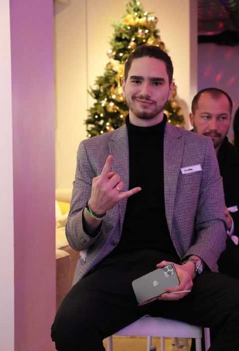 Tristan Gross at a holiday season networking event
