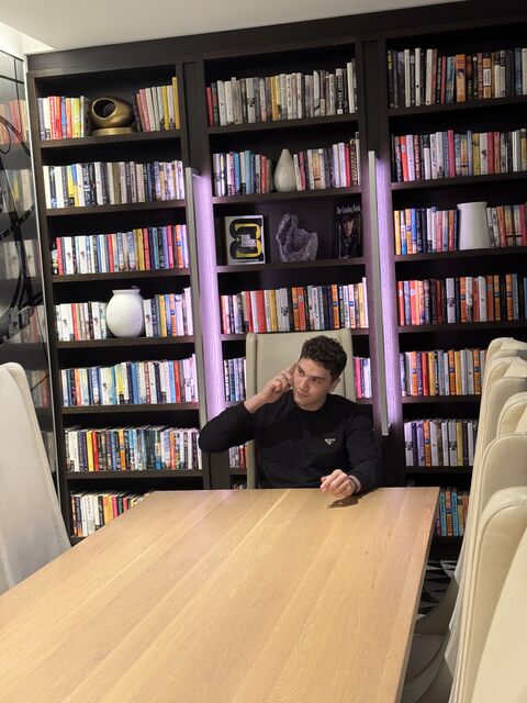 Tristan Gross taking a business call in his home office