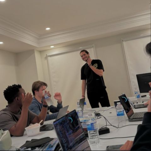 Tristan Gross presenting to the team during a working meeting