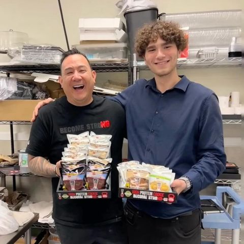 Tristan Gross showcasing a product launch with a business partner