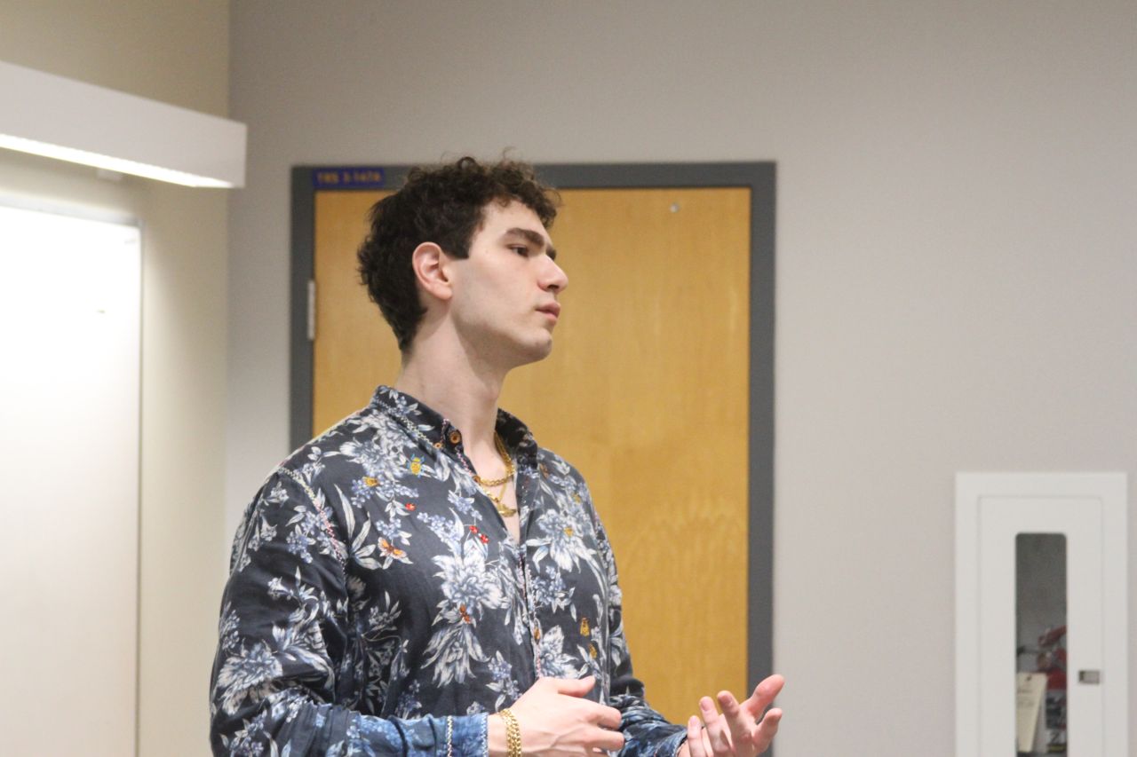 Tristan Gross speaking to an audience